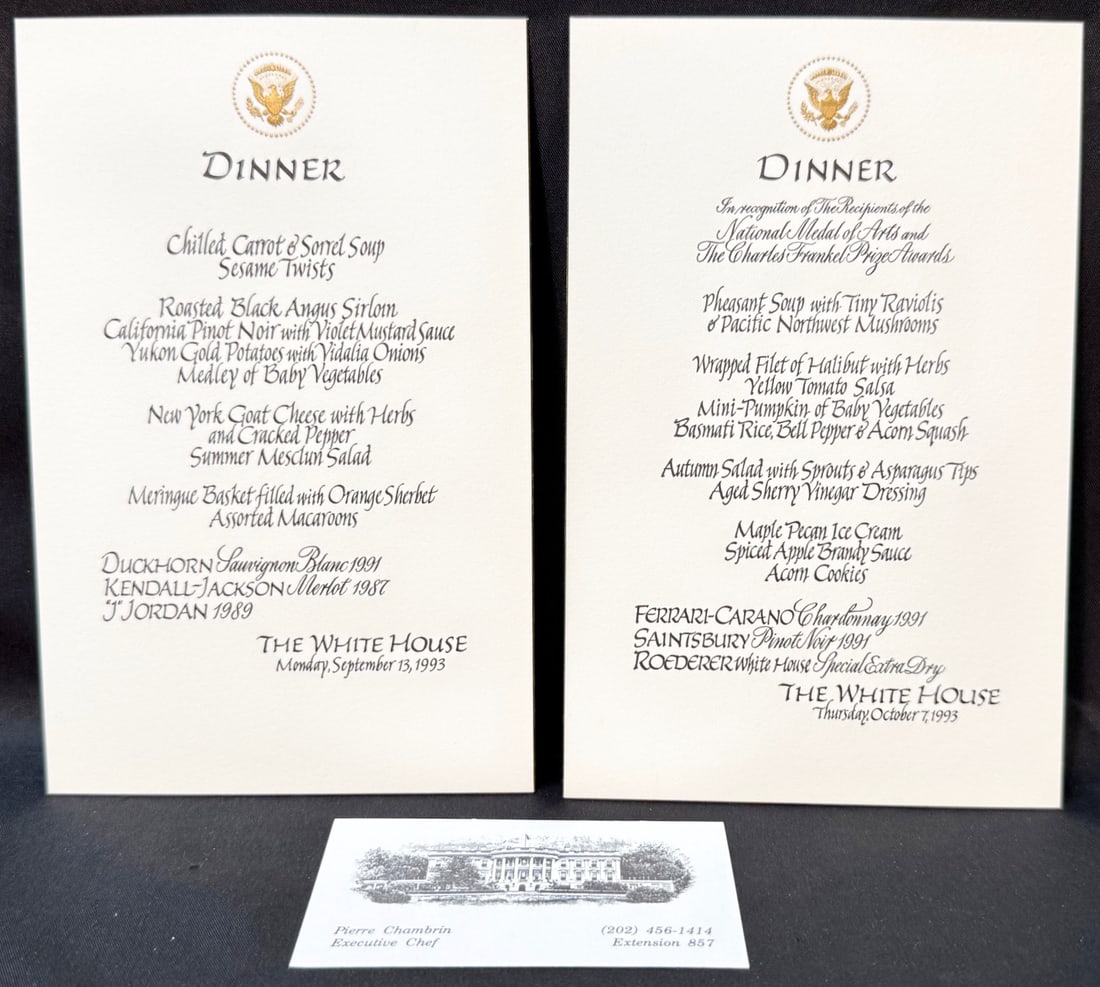 WHITE HOUSE FORMAL DINNER MENU CARDS, ESTATE OF FORMER WHITE HOUSE EXECUTIVE CHEF PIERRE CHAMBRIN,: A historically important pair of original formal White House dinner menu cards from 1993, directly from the estate of former White House Executive Chef Pierre Chambrin, whose tenure inside the Executi