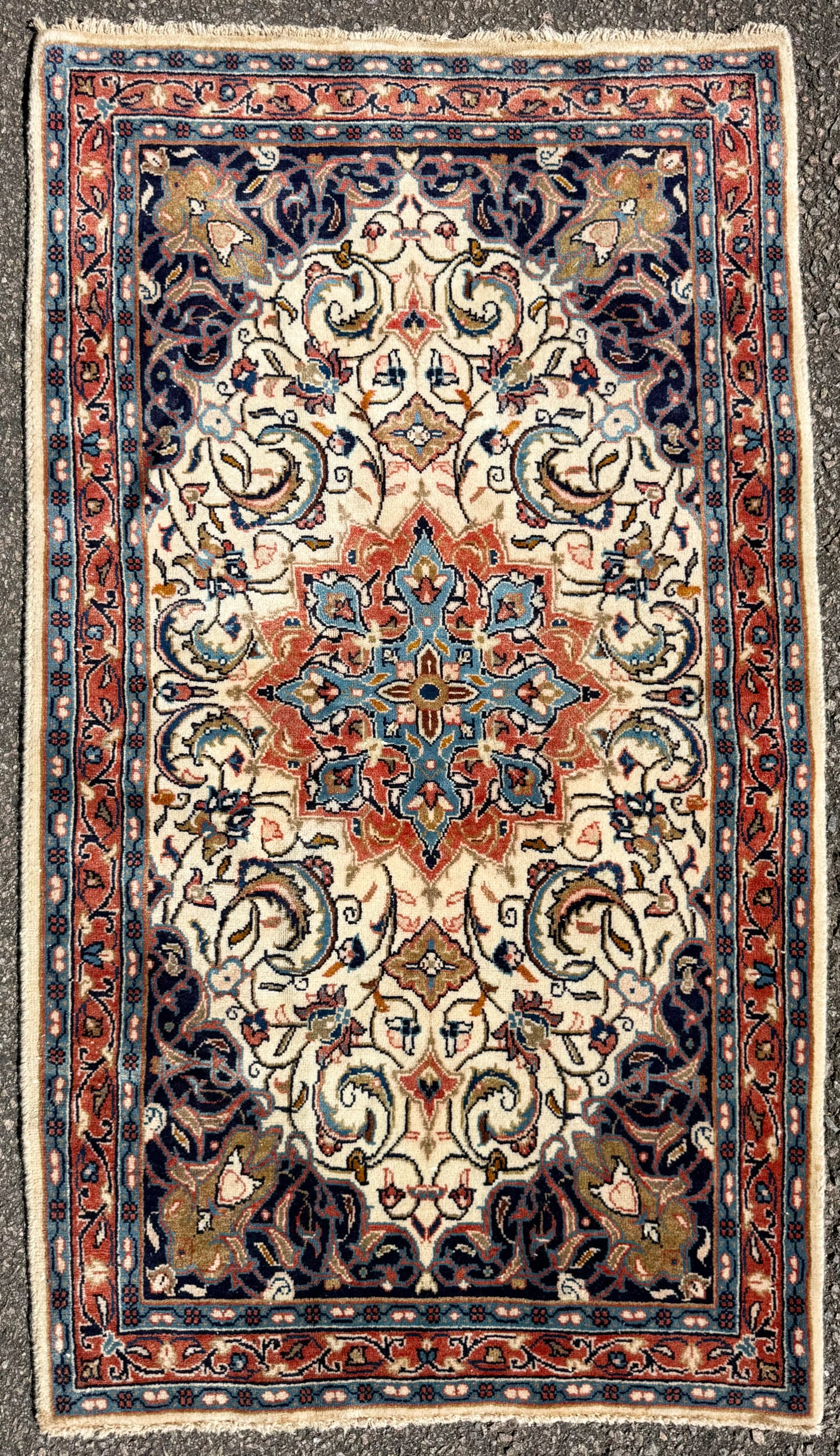 VINTAGE PERSIAN ISFAHAN HAND KNOTTED RUG, 2.7 x 4.8 (79cm x 142cm): This Vintage Persian Isfahan rug, was hand knotted in Iran of 100% natural wool on a cotton foundation. This rug features an elegant ivory field centered by an intricate floral medallion surrounded by