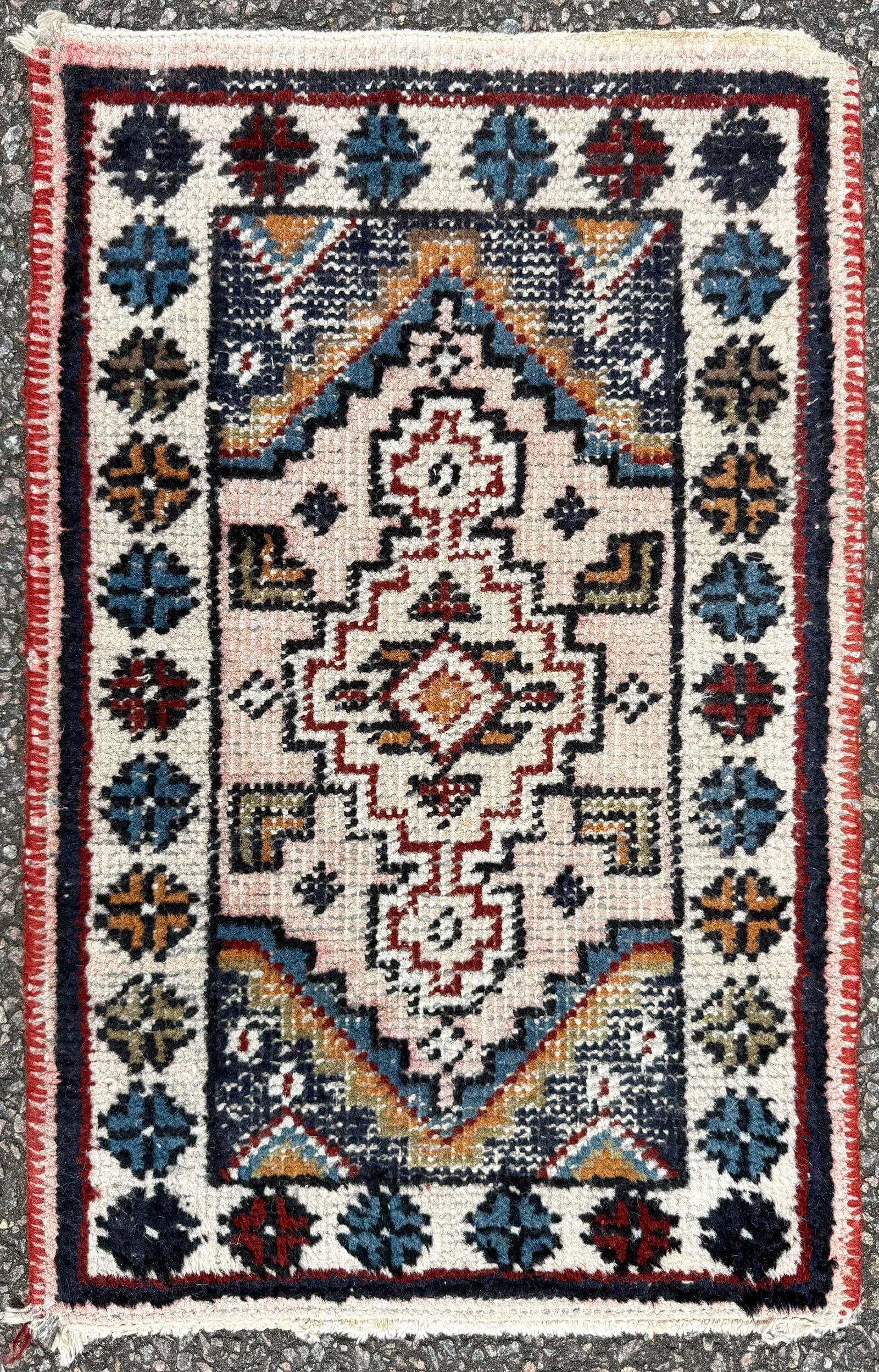 ANTIQUE CAUCASIAN SHIRVAN HAND KNOTTED RUG, 1.3 x 2.0 (38cm x 61cm): An antique Caucasian Shirvan rug was hand knotted in what is now Azerbaijan of 100% natural wool on a cotton foundation. This striking antique Caucasian Shirvan rug is distinguished by its highly
