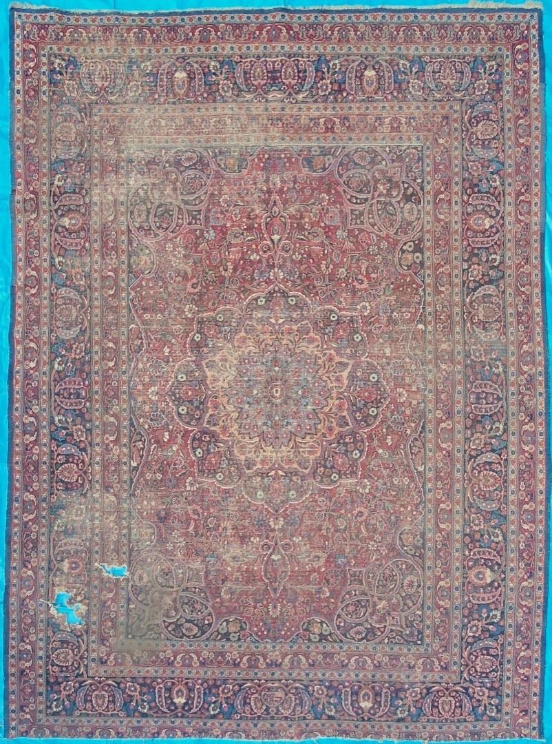 ANTIQUE SIGNED PERSIAN ISFAHAN HAND KNOTTED RUG, DISTRESSED, 9.6 x 12.9 (290cm x 389cm): Antique Persian Isfahan rug, was hand knotted in Iran of 100% natural wool on a cotton foundation. This rug is 100+ years old, has medium to low wool piles and is in excellent condition for its&#