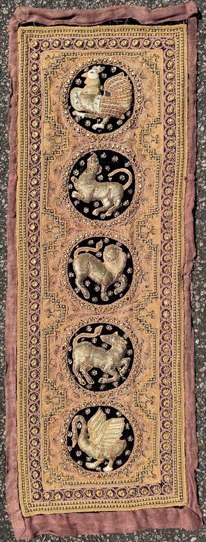 VINTAGE BURMESE KALAGA THAI NEEDLEWORK EBROIDERY WITH FIVE ZODIAC SIGNS, 18IN x 49IN (46cm x 124cm): Very elaborate, hand-stitched embroidery work using brass sequins, glass beads, golden wound cotton cords of yellow, beige, brown, orange and grey on a black velvet background. The animal figures are 