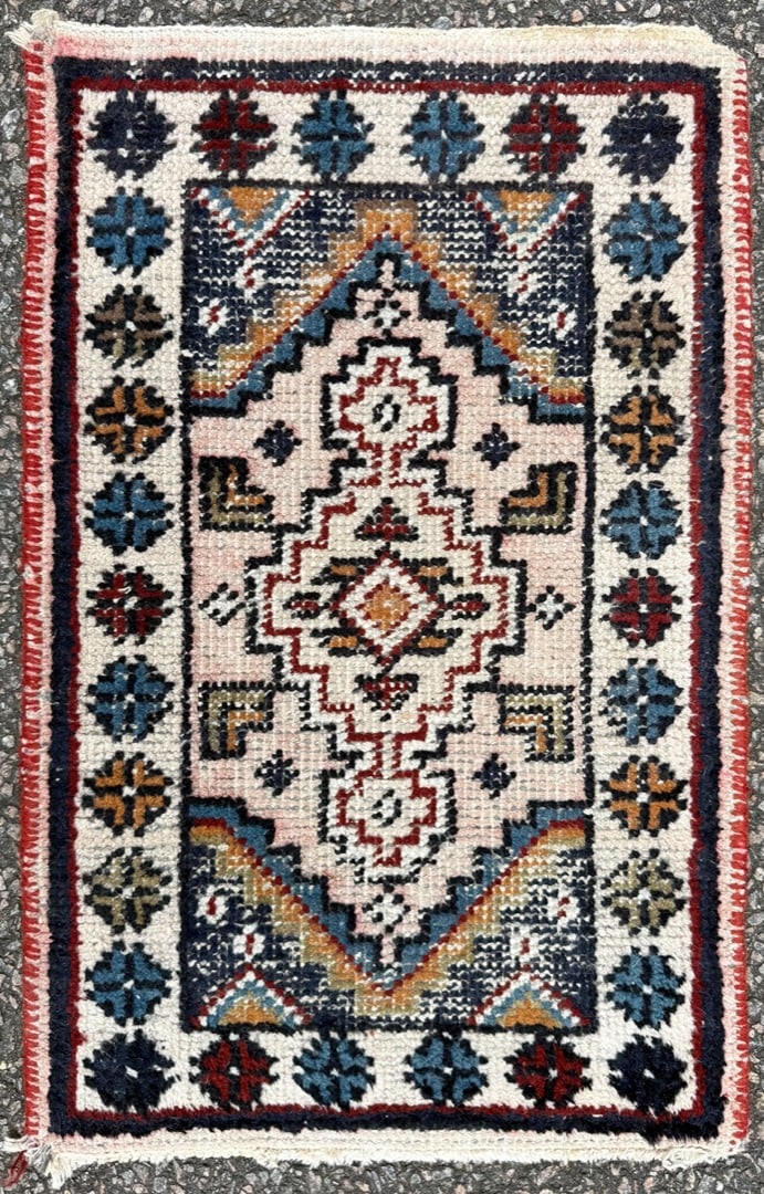 ANTIQUE CAUCASIAN SHIRVAN HAND KNOTTED RUG, 1.3 x 2.0 (38cm x 61cm): An antique Caucasian Shirvan rug was hand knotted in what is now Azerbaijan of 100% natural wool on a cotton foundation. This striking antique Caucasian Shirvan rug is distinguished by its highly
