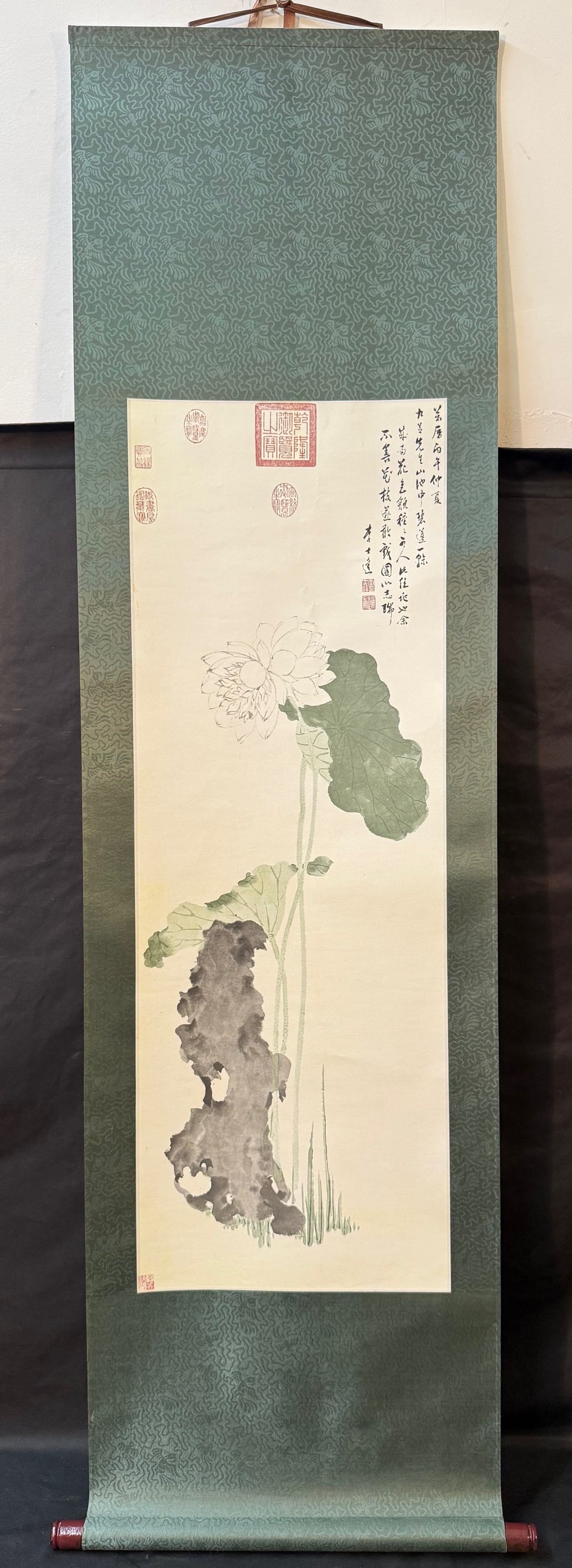 CHINESE LOTUS HANGING SCROLL, INK & COLOR ON PAPER, ZEN MINIMALIST SCHOLAR?S ART, 18.5IN x 67IN: A refined and contemplative Chinese hanging scroll depicting a lotus in the classical literati tradition, executed in ink and subtle color on paper and mounted in an elegant silk brocade surround. Thi