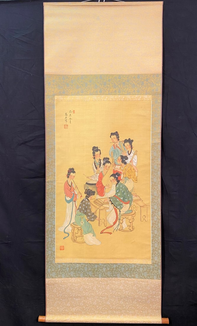 CHINESE SCROLL PAINTING OF 8 WOMEN PLAYING MUSICAL INSTRUMENTS ? 26 IN x 71 IN: A Chinese scroll painting depicting 8 women playing various musical instruments. A beautiful and colorful painting attached to a silk backing. Signed in the upper left corner. The entire scroll measur