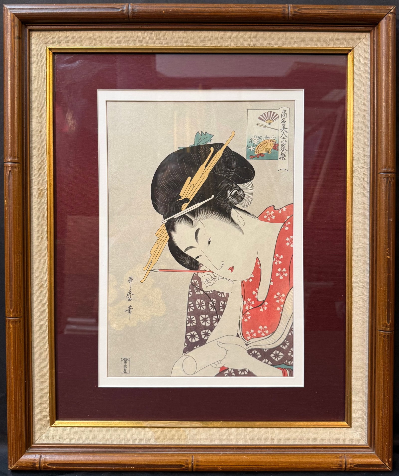 JAPANESE WOODBLOCK PRINT BY KITAGAWA UTAMARO (1753-1806) TITLED THE COURTESAN HANAGOI, 20IN x 24IN: Japanese woodblock print by Kitigawa Utamaro (1753-1806) titled The Courtesan Hanagoi of Ogiya, from the series Famous Beauties from Six Houses. This piece was created in 1930s and is part of the famo