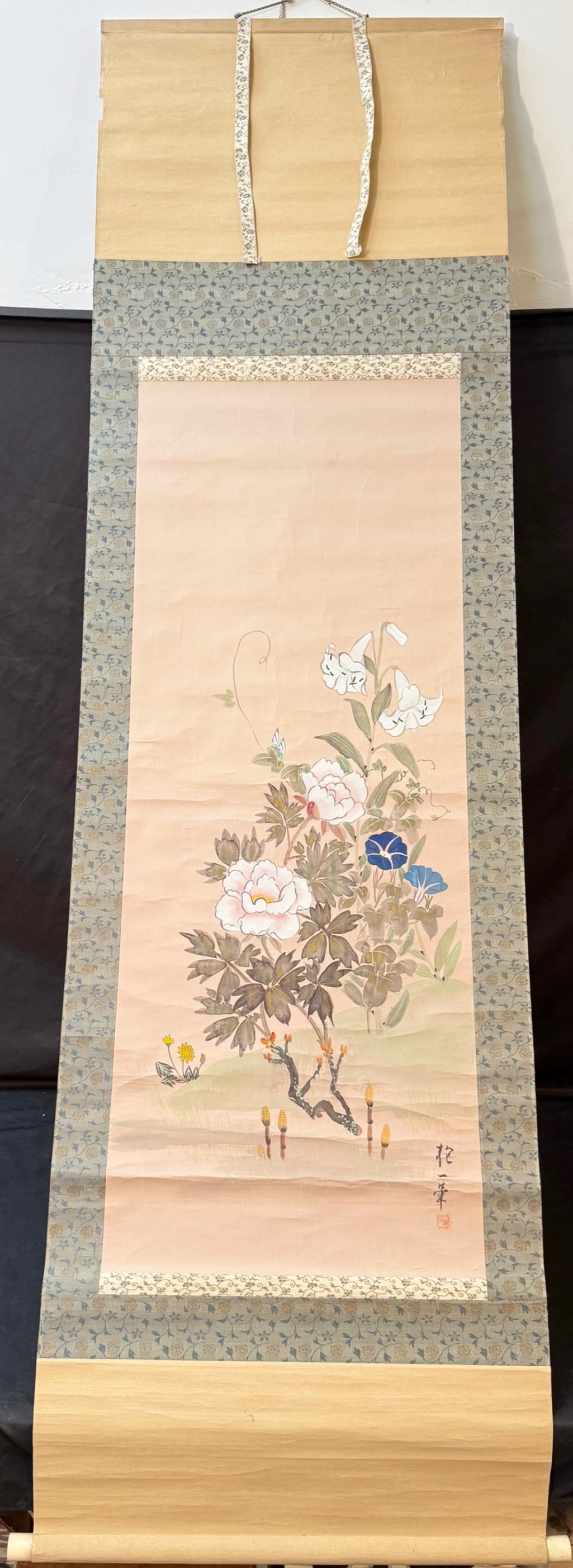 ORIGINAL HO IPPITSU (EARLY 20th CENTURY) JAPANESE NIHONGA FLORAL SCROLL PAINTING, 23.5IN x 75.5IN: An original Ho Ippitsu (Early 20th Century) Japanese Nihonga, floral scroll painting depicting Peonies, morning glories, lilies, and horsetails, which is a four-season floral ensemble, all are arrange