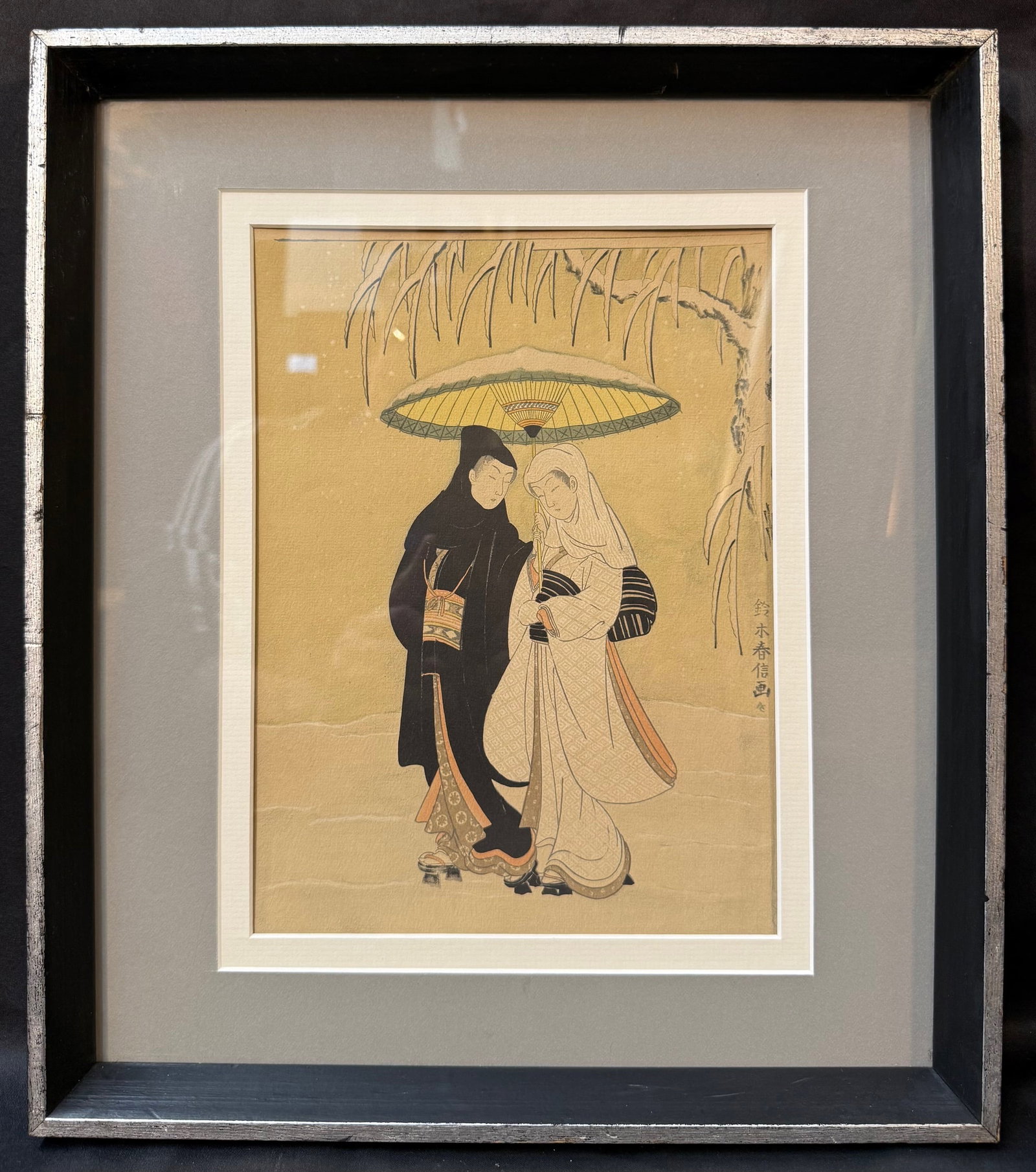 SUZUKI HARUNOBU (1725?1770) JAPANESE UKIYO-E BIJIN-GA WOODBLOCK PRINT AFTER THE EDO PERIOD MASTER,: An elegant Japanese ukiyo-e woodblock print after the celebrated Edo-period master Suzuki Harunobu (1725?1770) titled a Couple Walking Beneath an Umbrella in Snow. Harunobu is one of the most importan