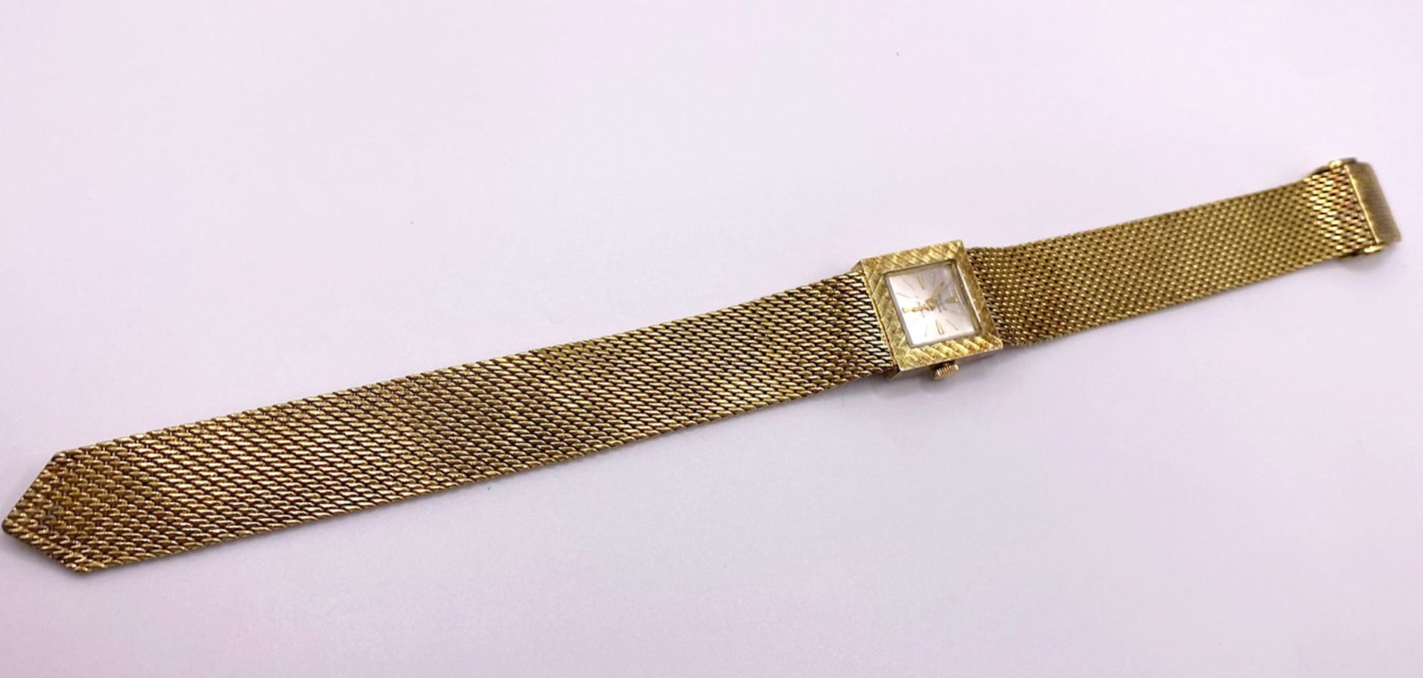 VINTAGE LADIES GERMINAL VOLTAIRE 17 JEWEL WATCH: Vintage Germanal Voltaire Ladies wristwatch. It has a square-shaped case and it features mechanical movement and 17 jewels, ensuring accurate timekeeping.?It has an adjustable, Milanese mesh band. The