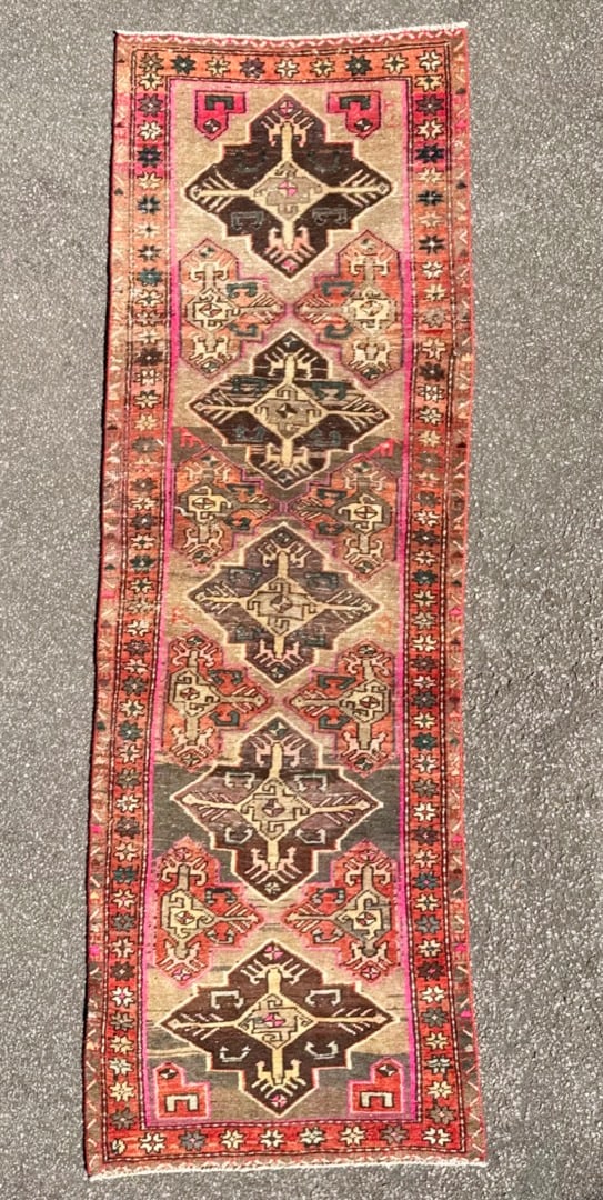 ANTIQUE PERSIAN HERIZ HAND KNOTTED RUNNER, 3.2 x 9.5 (97cm x 287cm): Offered here is an antique Persian Heriz runner that was hand knotted in Iran of 100 percent natural wool on a cotton foundation. This rug is 100+ years old, has medium to low wool piles and is i