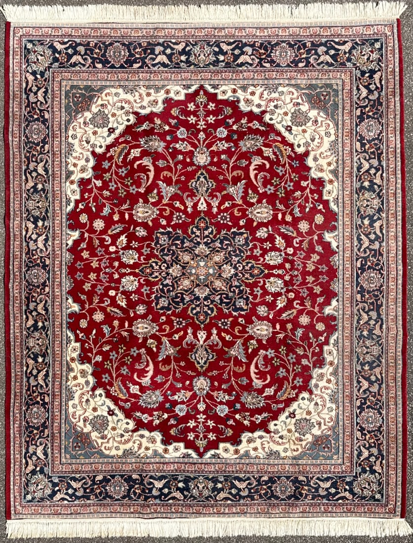 KASHAN HAND KNOTTED RUG, 7.5 x 9.2 (226cm x 279cm): This Kashan Rug was hand knotted in Pakistan of 100 percent natural wool on a cotton foundation. This rug has full wool piles and is in like new condition. This rug features a richly saturated ruby-