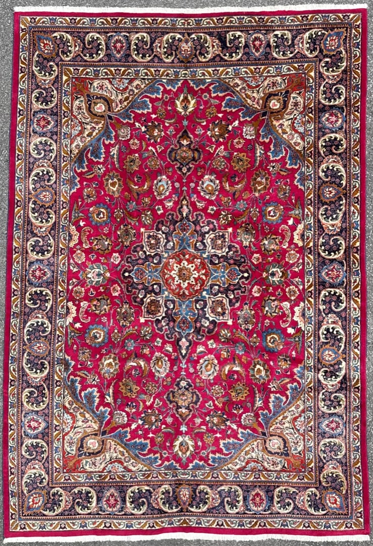 VINTAGE PERSIAN MASHAD HAND KNOTTED RUG, 7.11 x 11.6 (241cm x 351cm): This hand-knotted Persian Mashad rug embodies the kind of refined elegance and visual softness that defines a truly elevated interior. The composition centers around a delicately structured floral med