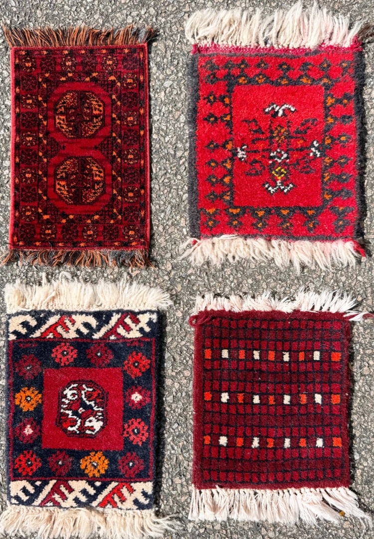 FOUR TABLETOP HAND KNOTTED RUGs, 10 x 12 EACH (25cm x 30cm): A compelling group of four antique tribal bag faces, handwoven by nomadic artisans of the Persian / Afghan regions, originally part of functional saddlebags (khorjin) used in daily tribal life. Today,