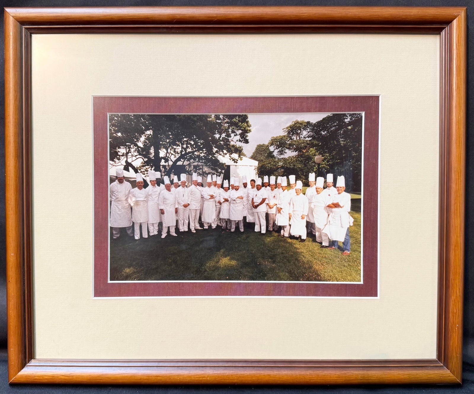 OFFICIAL WHITE HOUSE CULINARY STAFF PHOTOGRAPH FROM THE ESTATE OF CHEF PIERRE CHAMBRIN ESTATE, JUNE: An exceptional and historically significant Official White House photograph documenting the Executive Residence culinary staff during the early months of the Clinton Administration. Produced by the Wh