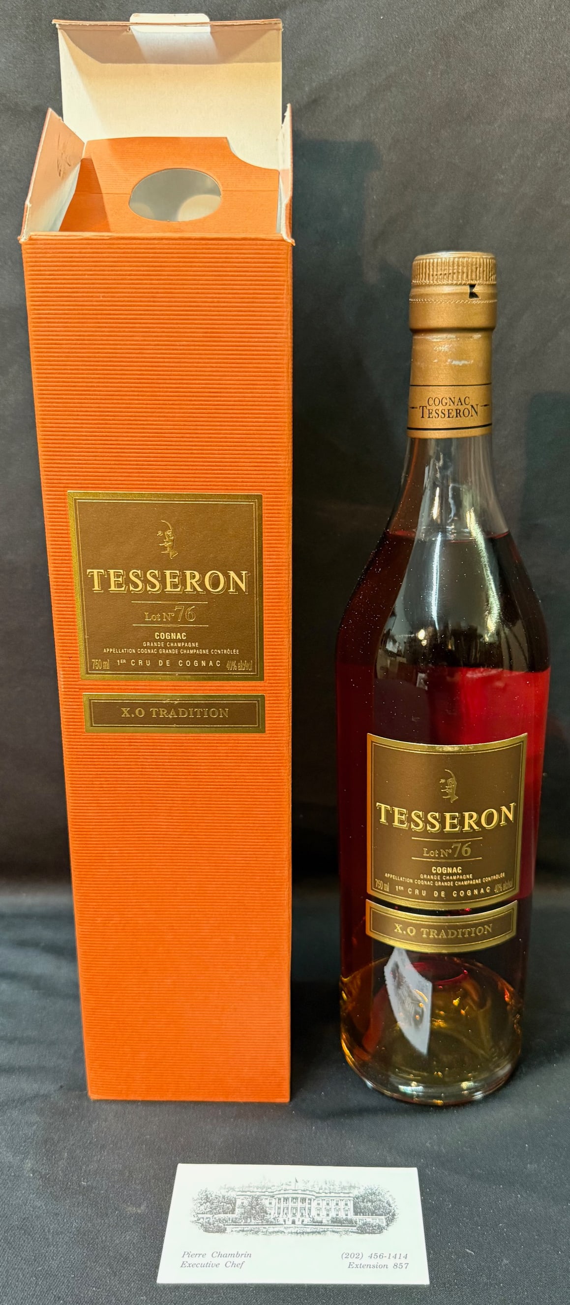 TESSERON LOT NO. 76 XO COGNAC, GRANDE CHAMPAGNE 1ER CRU, W/ BOX FROM THE ESTATE OF WHITE HOUSE CHEF: A refined and highly collectible bottle of Tesseron Lot No. 76 X.O Tradition Cognac, presented in its original box and sourced directly from the estate of Pierre Chambrin, the legendary French-born Ex