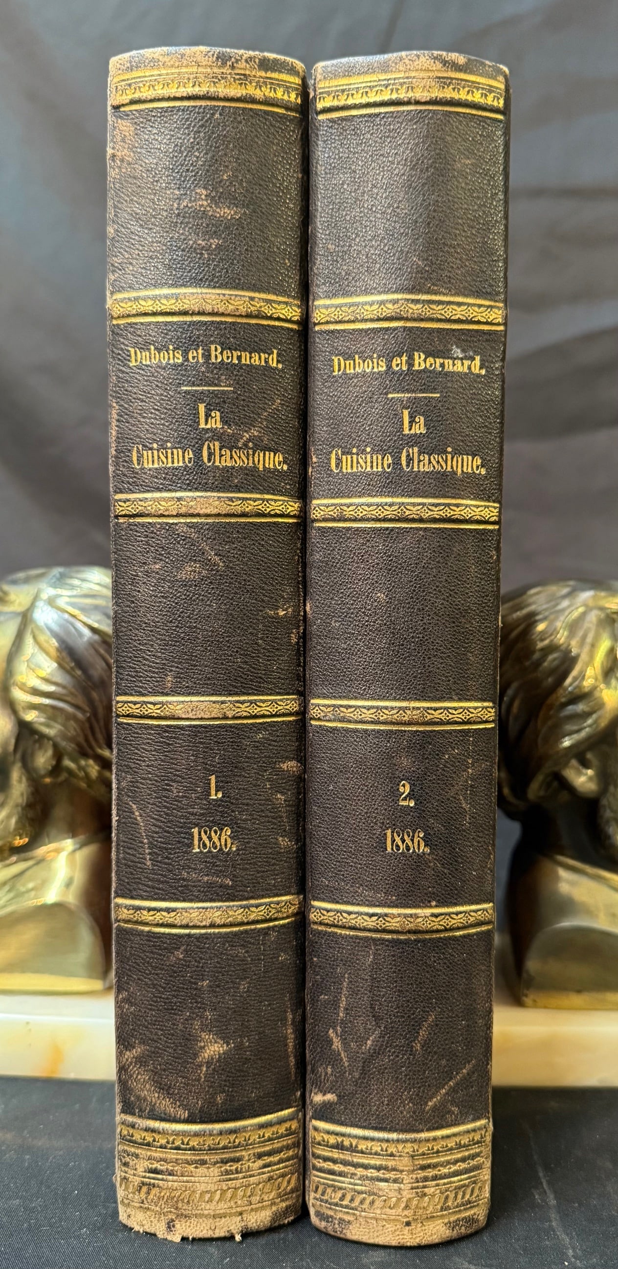 1886 URBAIN DUBOIS?LA CUISINE CLASSIQUE?(2 VOL.), FRENCH HAUTE CUISINE MASTERWORK, LIBRARY OF WHITE: A rare and historically significant two-volume 1886 Paris edition of La Cuisine Classique by Urbain Dubois and Émile Bernard, presented in original period binding and bearing the embossed library