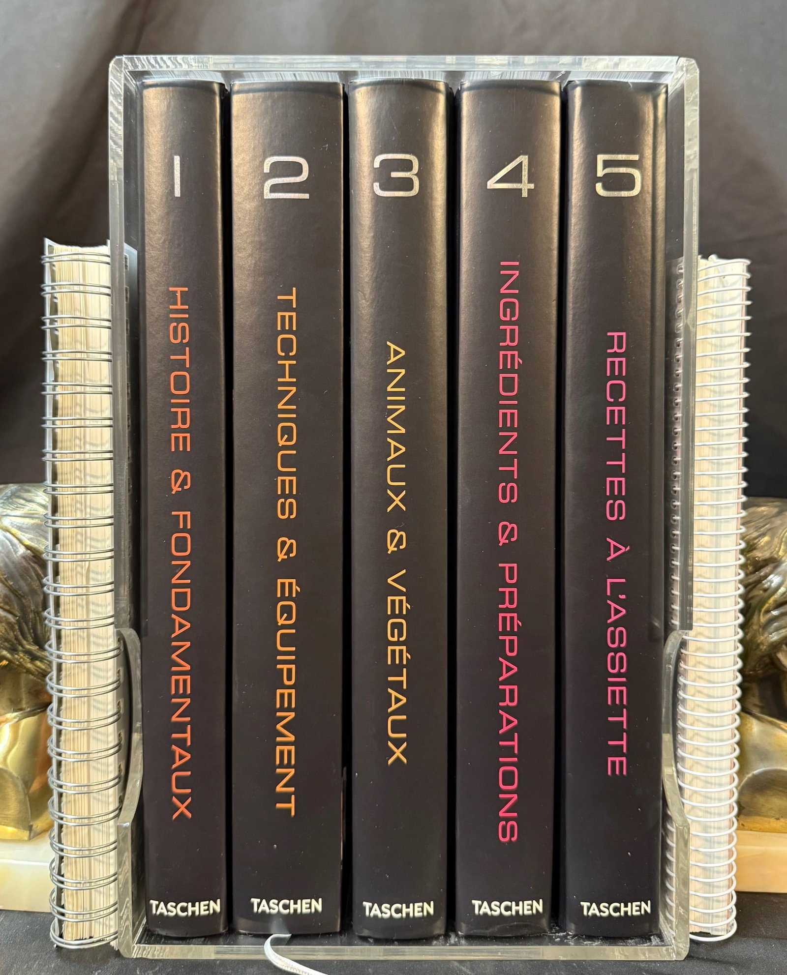 MODERNIST CUISINE (TASCHEN), COMPLETE 7 VOL. SET, ANNOTATED COPY FROM LIBRARY OF WHITE HOUSE CHEF: A complete and highly sought-after 7-volume set of Modernist Cuisine: Art et science culinaires (Taschen edition), including the full five-volume reference library with original acrylic case and the s