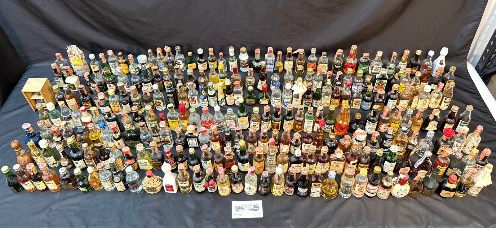 245+ VINTAGE MINIATURE LIQUOR BOTTLES, AIRLINE MINIS COLLECTION, WHITE HOUSE CHEF PIERRE CHAMBRIN: A remarkable 245+ piece vintage miniature spirits collection from the estate of White House Executive Chef Pierre Chambrin. This is a visually stunning, globally sourced archive of airline-era liquor 
