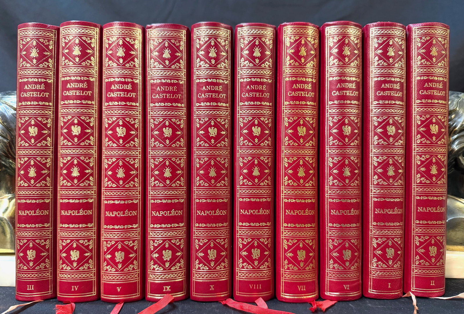 COMPLETE 10 VOLUME ANDR? CASTELOT ?NAPOL?ON BONAPARTE?, GILT RED FRENCH BINDINGS, WHITE HOUSE: An exceptional and visually commanding 10-volume French historical set on Napoléon Bonaparte by renowned historian André Castelot, presented in richly decorated full red bindings with elabor
