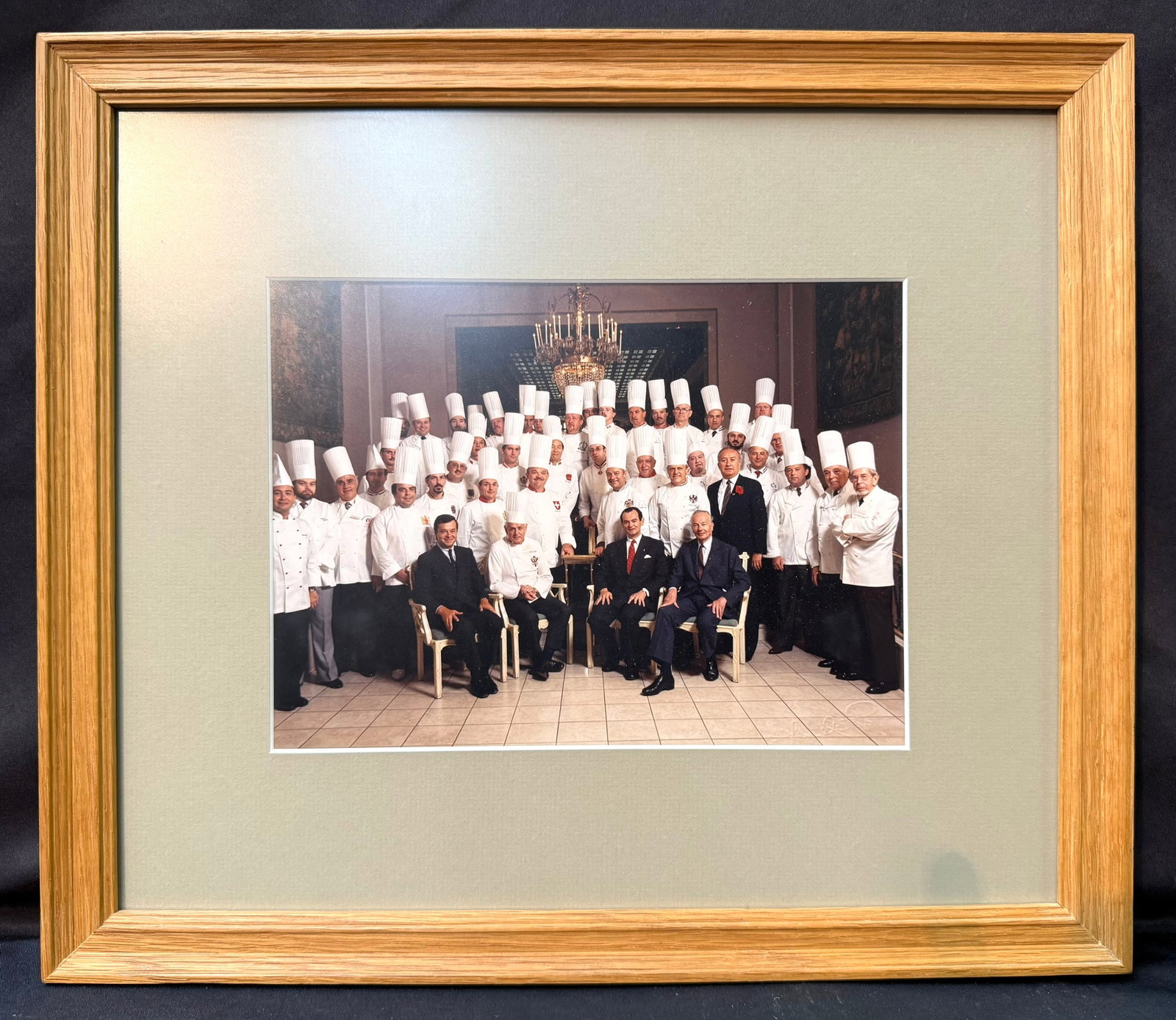 PHOTO FROM ESTATE OF WHITE HOUSE EXECUTIVE CHEF PIERRE CHAMBRIN OF A MASTER CHEFS OF FRANCE: Offered from the personal estate of Former White House Executive Chef Pierre Chambrin is an exceptional original framed color photograph believed to depict a Master Chefs of France (Maîtres Cuisi