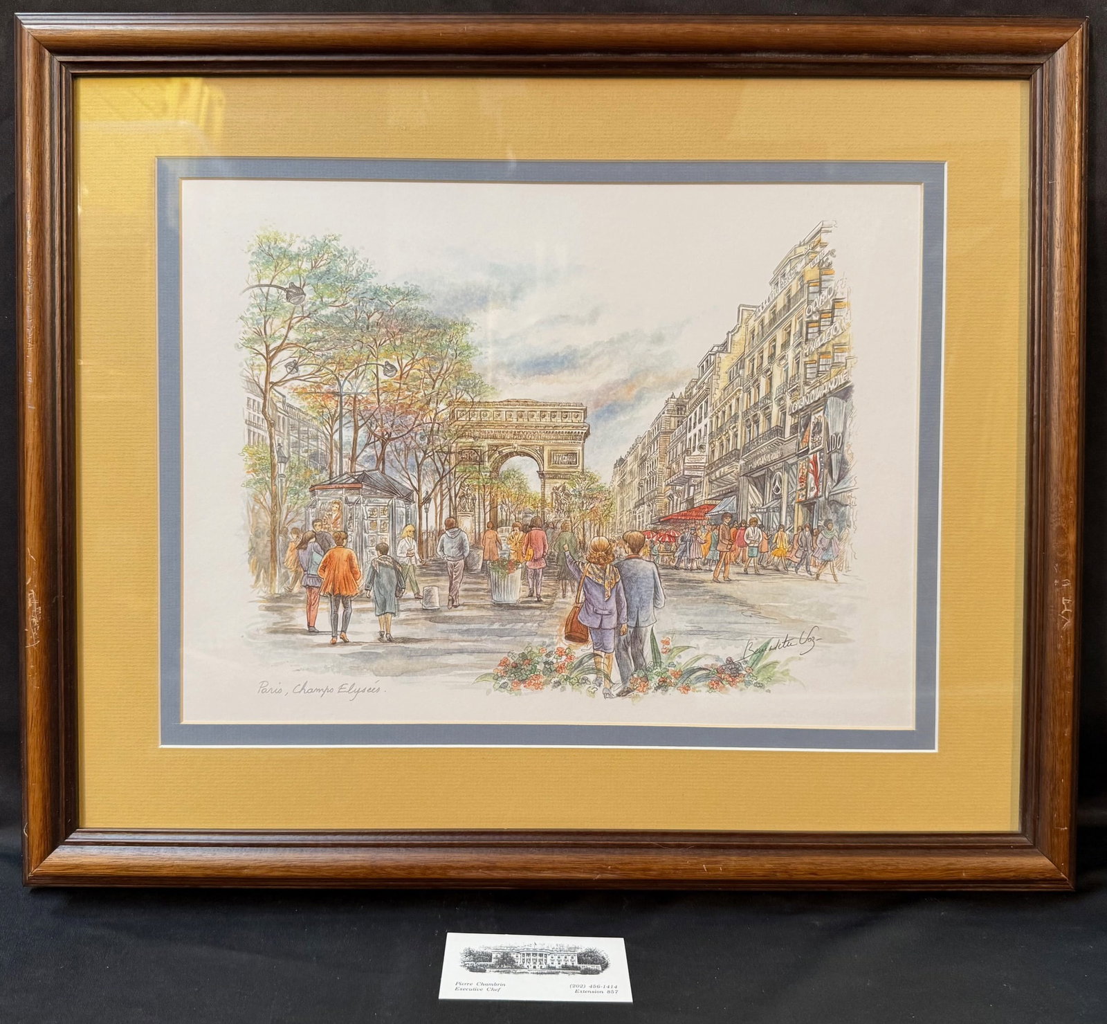 PARIS NOTRE DAME LITHOGRAPH BY BERNADETTE LEY, WHITE HOUSE CHEF PIERRE CHAMBRIN ESTATE, 18.5IN x: This hand signed lithograph presents Notre Dame Cathedral not as a postcard image, but as a refined study in structure, atmosphere, and Parisian life. The composition is balanced and intentional: soft