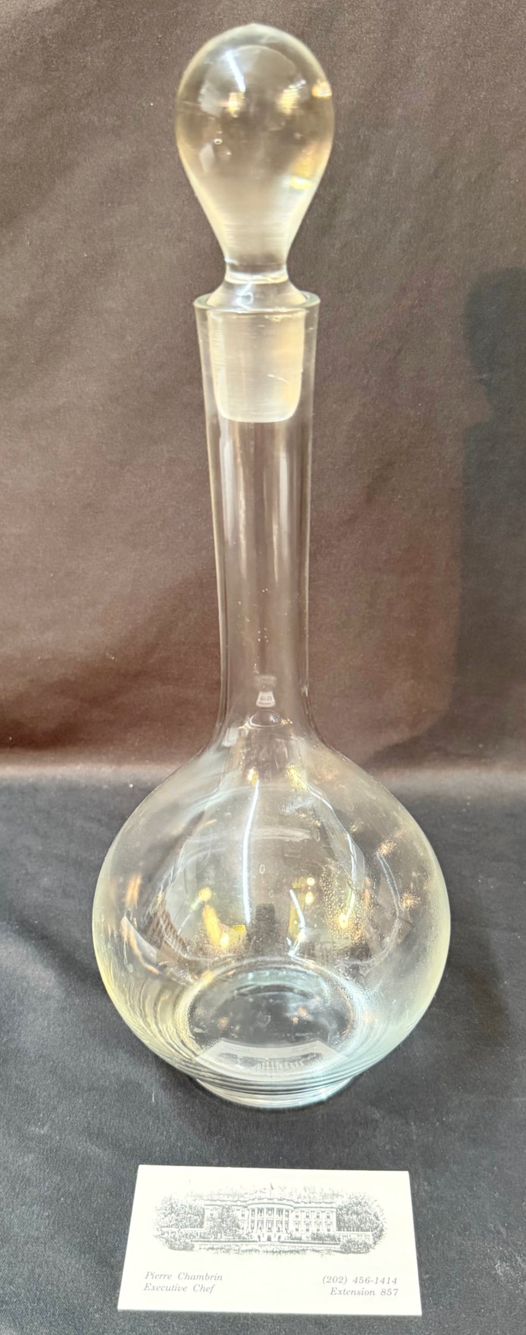 WHITE HOUSE EXECUTIVE CHEF PIERRE CHAMBRIN CRYSTAL DECANTER, FROM HIS EXTENSIVE BAR, 5IN x 5IN x: This is a personal piece of executive hospitality culture tied directly to the service environment of the White House. Offered here is a refined crystal decanter from the estate of Pierre Chambrin, fo