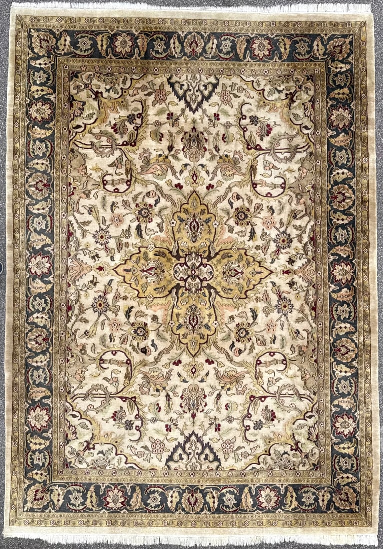 LARGE HAND-KNOTTED RUG GIVEN TO PIERRE AND LINDA CHAMBRIN BY SABRINA AND JOHN AS A THANK YOU FOR: This large hand-knotted carpet comes from the estate of Pierre Chambrin, former White House Executive Chef, and carries something far more valuable than generic inventory—it carries real lived-i