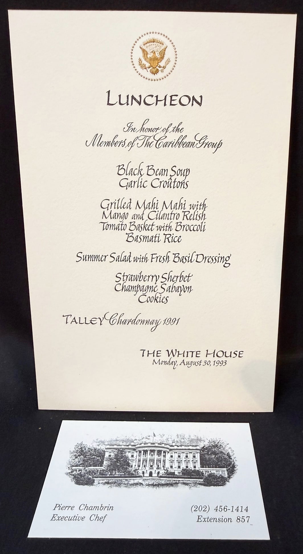 WHITE HOUSE LUNCHEON MENU HONORING THE MEMBERS OF THE CARIBBEAN GROUP, AUGUST 30, 1993, ESTATE OF: This is an authentic formal White House luncheon menu card produced for a diplomatic luncheon held at The White House on Monday, August 30, 1993, during the administration of Bill Clinton. The luncheo