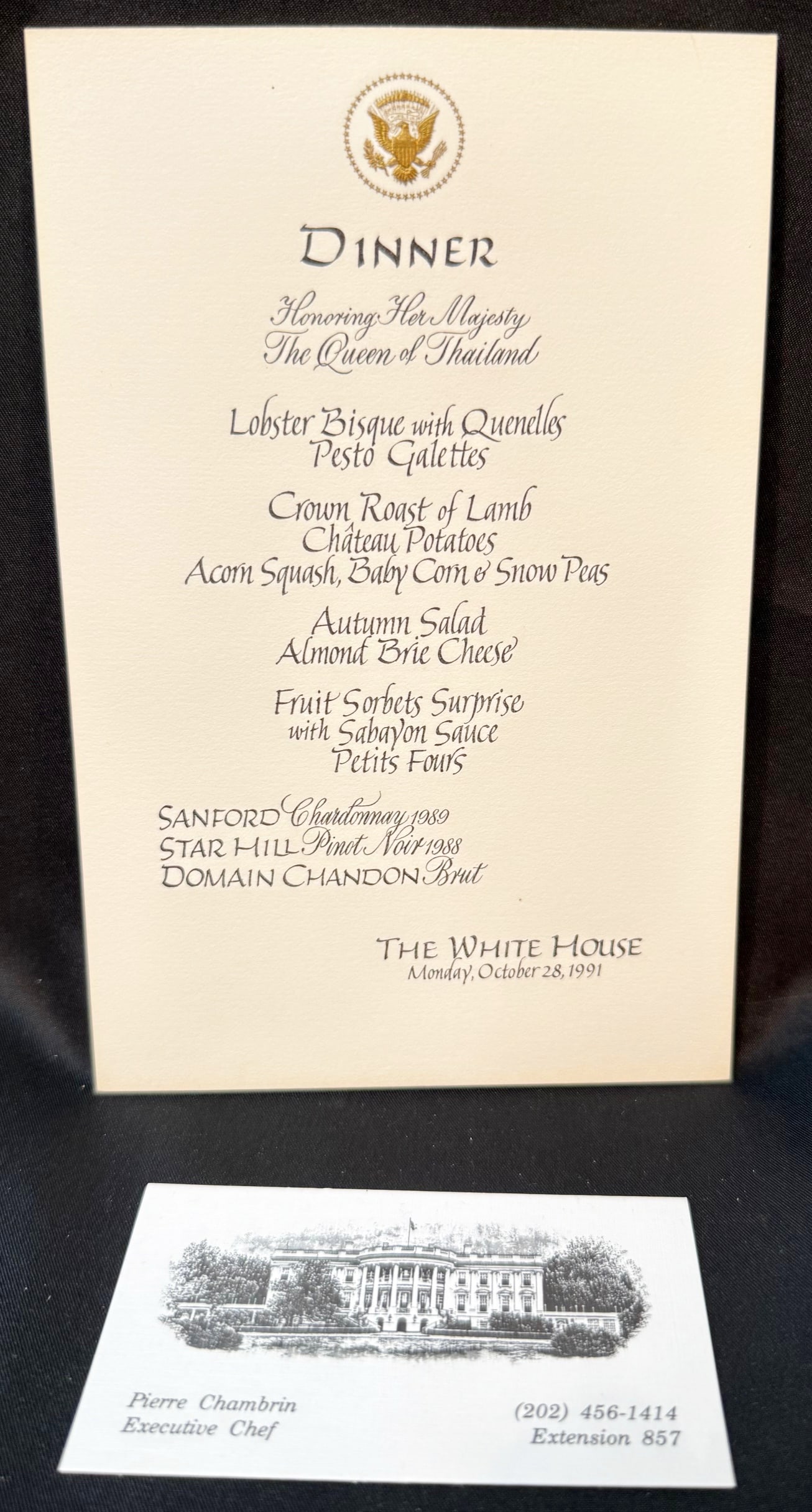 WHITE HOUSE DINNER MENU, OCTOBER 28, 1991, HONORING THE QUEEN OF THAILAND, ESTATE OF EXECUTIVE CHEF: This is an elegant and historically important formal White House state dinner menu card from the estate of Pierre Chambrin, created for a state dinner honoring Queen Sirikit at The White House on Mond