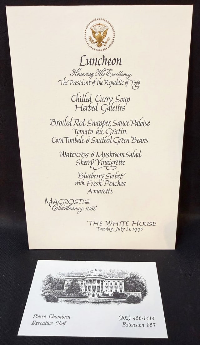 WHITE HOUSE LUNCHEON MENU, JULY 31, 1990, HONORING THE PRESIDENT OF TOGO, ESTATE OF EXECUTIVE CHEF: This is an exceptionally refined formal White House luncheon menu card from the estate of Pierre Chambrin, created for a diplomatic luncheon honoring the President of the Republic of Togo, Gnassingb&#