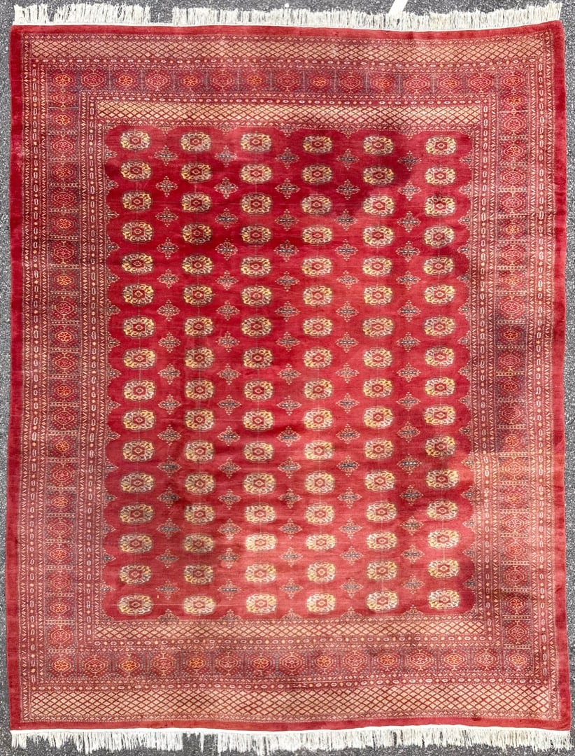 BUKHARA HAND KNOTTED RUG, 9.5 x 12.0 (287cm x 366cm): This Bukhara Tekke rug was hand knotted in Pakistan of 100% natural wool on a cotton foundation. This rug has full wool piles and is in excellent condition. Beautiful colors with excellent q