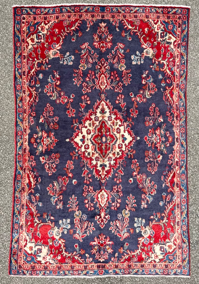 VINTAGE PERSIAN SAROUK HAND KNOTTED RUG, 5.4 x 8.0 (163cm x 244cm): Vintage Persian Sarouk rug was hand knotted in Iran of 100 percent natural wool on a cotton foundation. This rug is 60+ years old, has medium wool piles and is in excellent condition for its age.