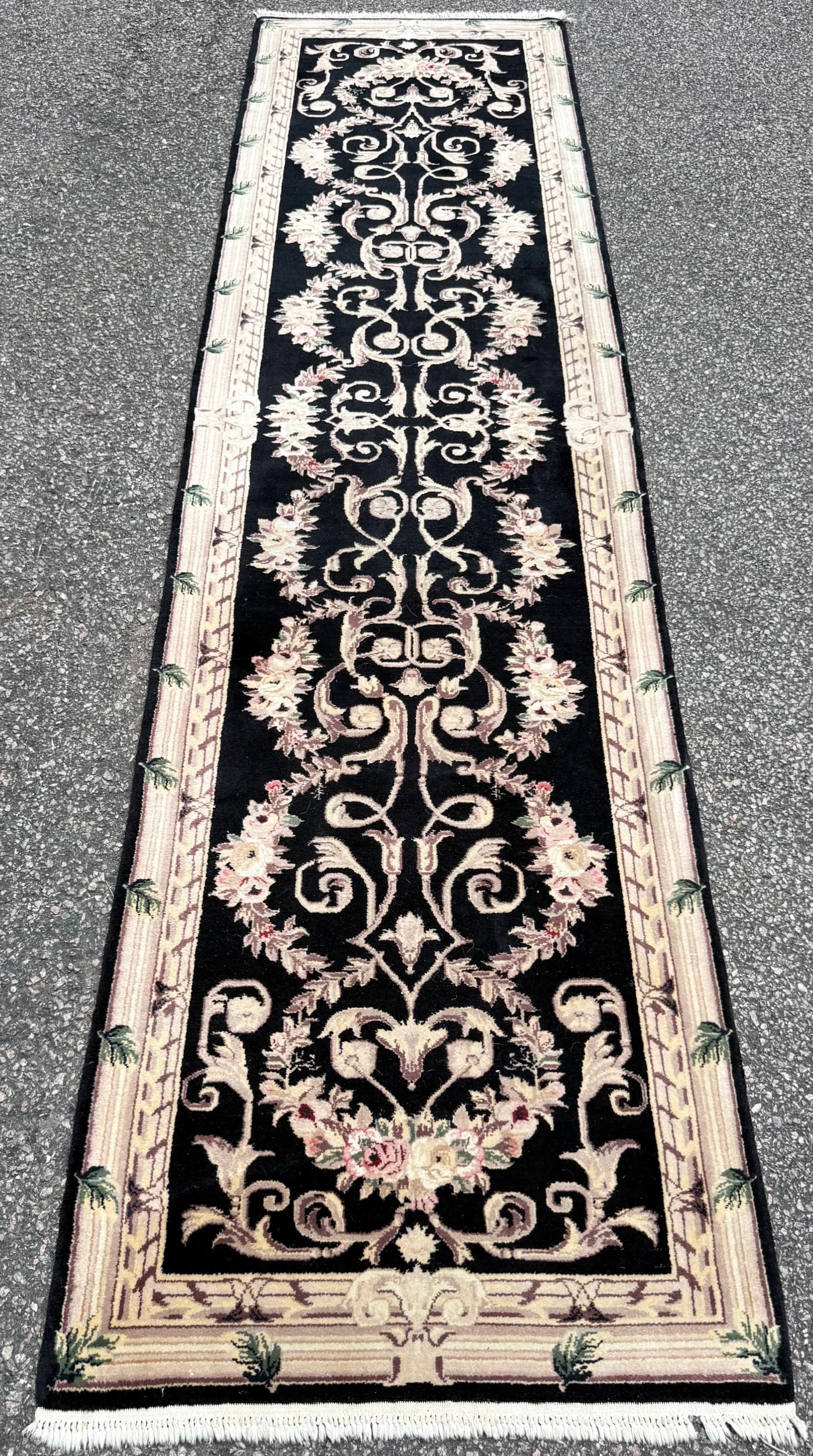 BLACK HAND-KNOTTED AUBUSSON RUNNER, 2.8 x 10.2 (81cm x 310cm): French inspired Aubusson runner was hand knotted in Pakistan of 100 percent natural wool on a cotton foundation. The rug has very thick wool piles and is in like new condition. Beautiful colors a
