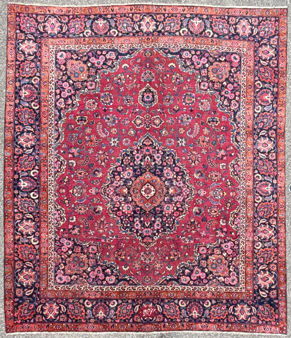 ANTIQUE, SIGNED PERSIAN MASHAD HAND KNOTTED RUG, 9.9 x 11.3 (297cm x 343cm): Offered here is an antique, Persian Mashad rug, hand knotted in Persia of 100% natural wool on a cotton foundation. This rug is 90+ years old and has medium to low wool piles and is in excellent 