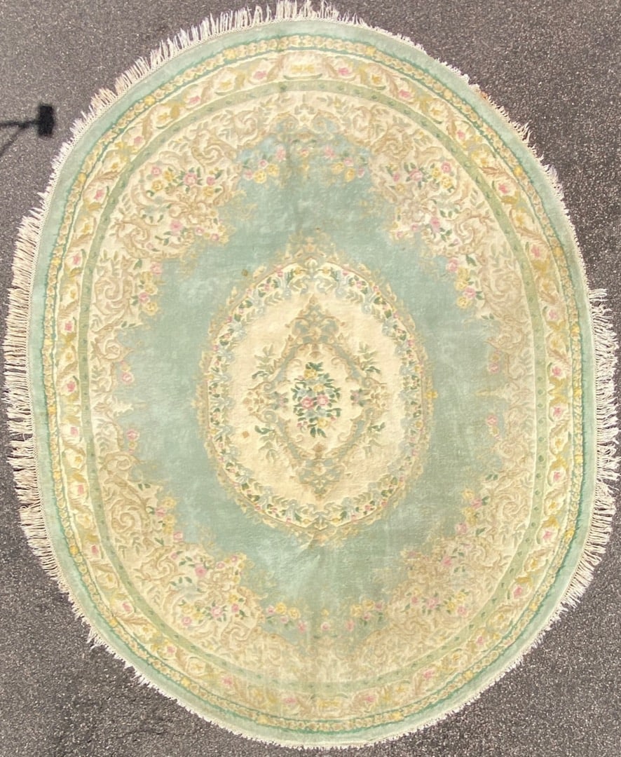 FRENCH STYLE AUBUSSON OVAL HAND KNOTTED RUG, 9.3 x 12.0 (282cm x 366cm): French style, oval Aubusson rug was hand knotted in China of 100 percent natural wool on a cotton foundation. The rug has very thick wool piles and is in excellent condition. Beautiful colors and