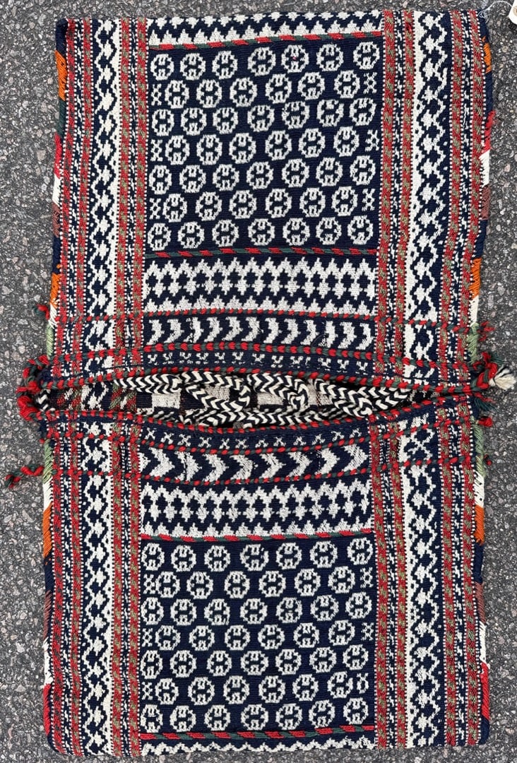 VINTAGE PERSIAN TRIBAL KHORJIN HAND WOVEN SADDLE BAG, 1.8 x 2.9 (51cm x 84cm): A striking and highly decorative Persian tribal saddlebag (khorjin), handwoven in wool by nomadic artisans of Southern Iran, most likely the Afshar tribe, mid-20th century. This is a complete double s