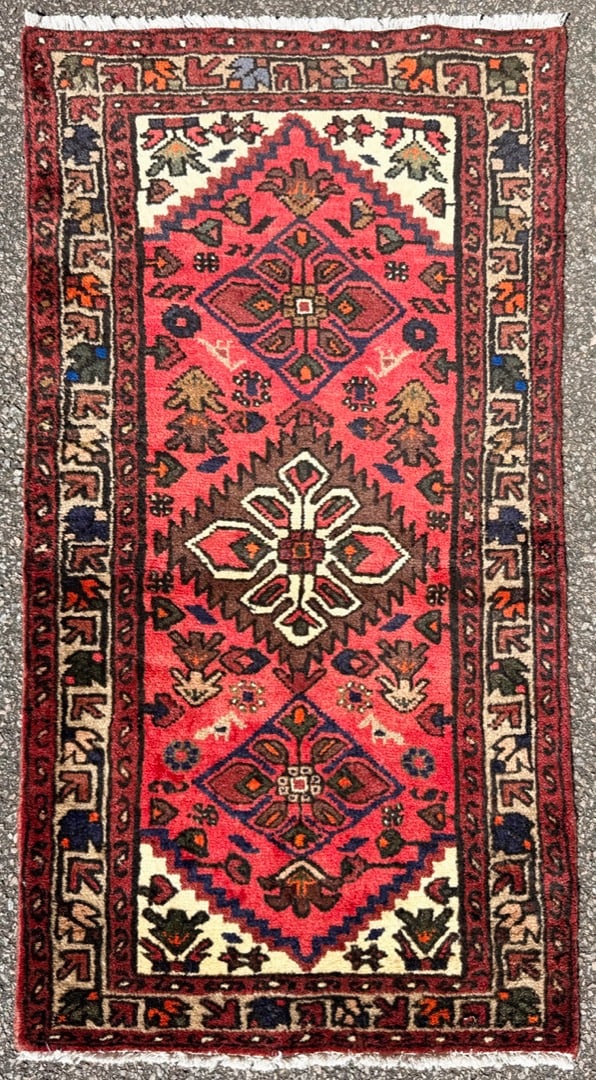 VIBRANT PERSIAN HAMADAN TRIBAL RUG, TRIPLE MEDALLION, IVORY BORDER, HAND KNOTTED, 2.2 x 4.2 (66cm x: A visually striking and highly decorative hand-knotted Persian Hamadan rug distinguished by its bold triple medallion composition set against an unusually vibrant red field, framed by a crisp ivory-gr
