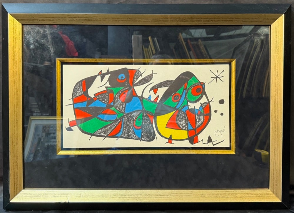 JOAN MIRO (1893-1983) LITHOGRAPH TITLED ESCULTOR FOR ITALY, 19.5IN X 27IN (55cm X 61cm): Lithograph by Spanish artist Joan Miro (1893-1983) titled Escultor For Italy. This piece is after the original which was painted in 1974 and is part of Miro’s Escultor series. With frame, it mea