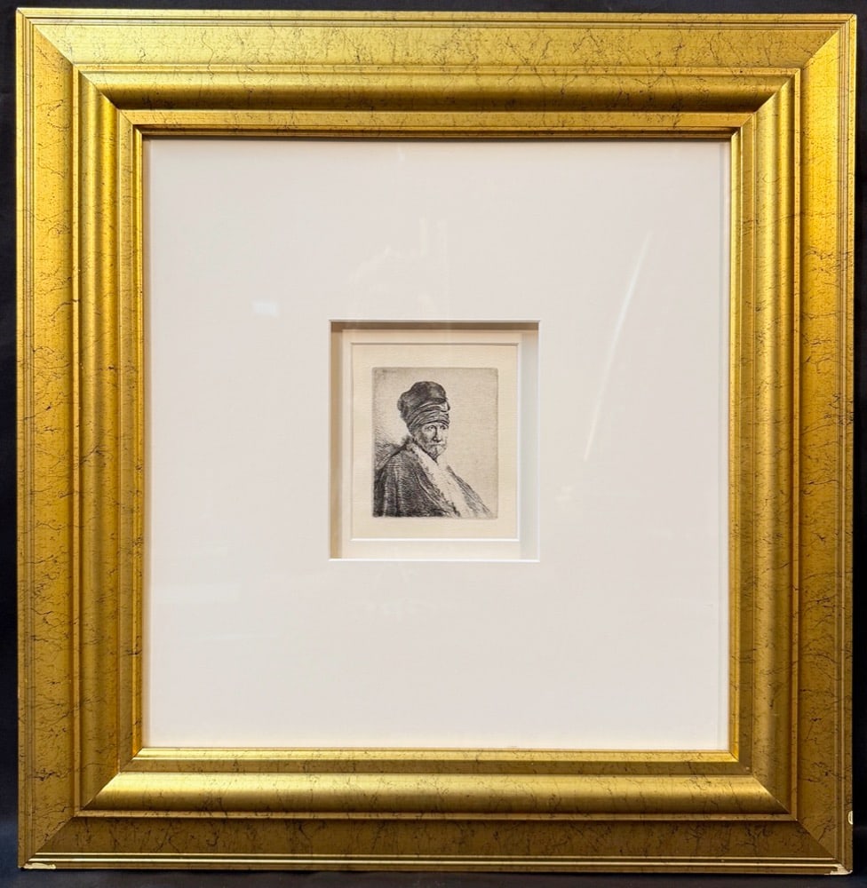 REMBRANDT VAN RIJN TITLED ?BUST OF MAN WEARING HIGH CAP? ETCHING, 21IN x 22IN (53cm x 56cm): A deeply evocative Old Master study by Rembrandt van Rijn, depicting a contemplative elder figure rendered with extraordinary sensitivity and presence—an image that embodies the psychological de