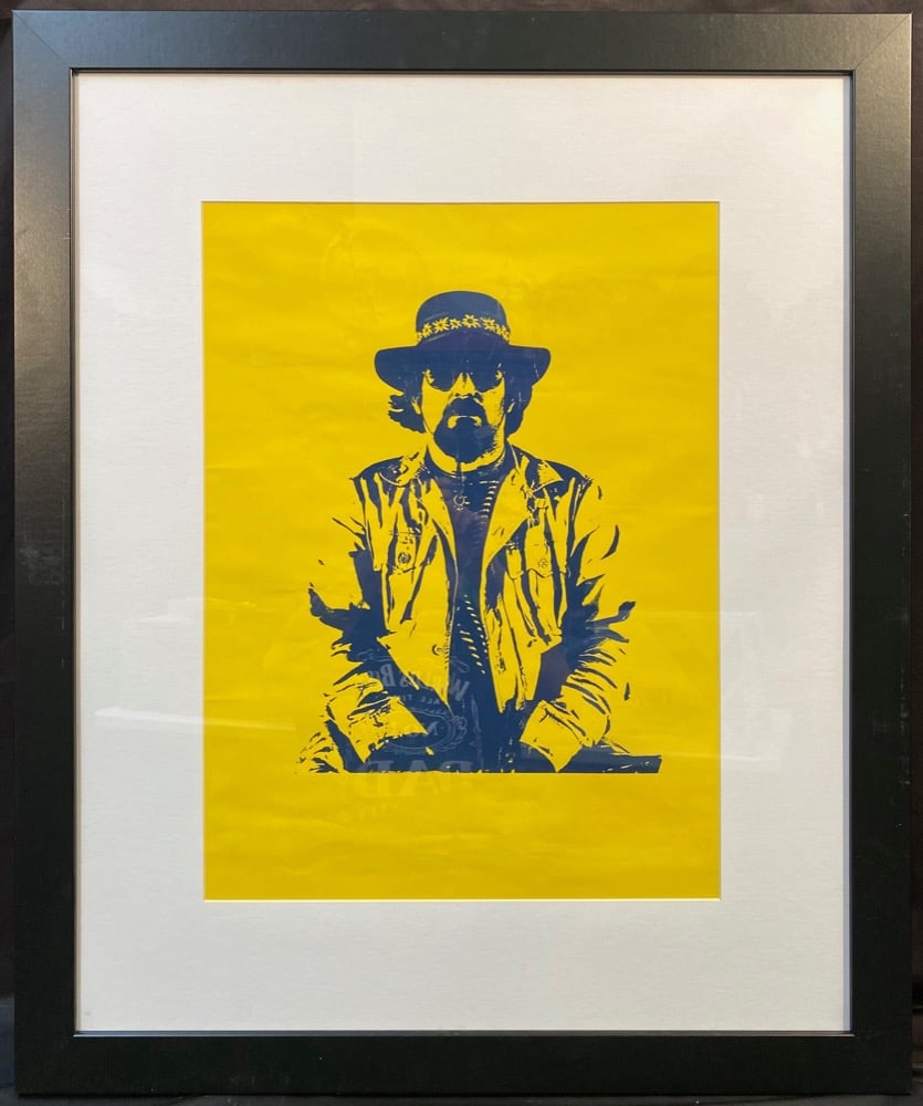 1980s ROCKSTAR POSTER, 29.5IN x 35.5IN (75cm x 90cm): 1980s rockstar poster. This piece is matted and framed under glass in a beautiful golden frame, and it measures 24.5 inches x 28 inches. This piece was acquired from the estate of an ex-employee of th