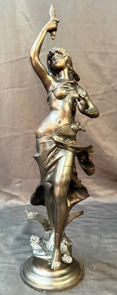 ERNEST RANCOULET (1870-1915) BRONZE STATUE OF WOMAN HOLDING A TORCH, 18IN x 5IN x 5IN (46cm x 13cm x: Bronze statue of a half-naked woman holding a torch by French sculptor Ernest Rancoulet (1870-1915). This piece measures 18 inches x 5 inches x 5 inches and it weighs 14 pounds. This piece was acquire