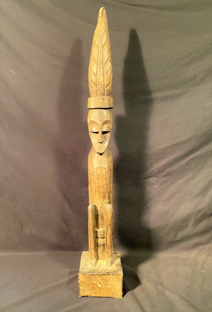 BALINESE STATUE MADE OF ALBACIA WOOD ? 39 IN TALL: Original Balinese carved statue made from Albacia wood. These types of statues were used as a type of tombstone thousands of years ago. More recently, they are used in funeral proceedings. They are be