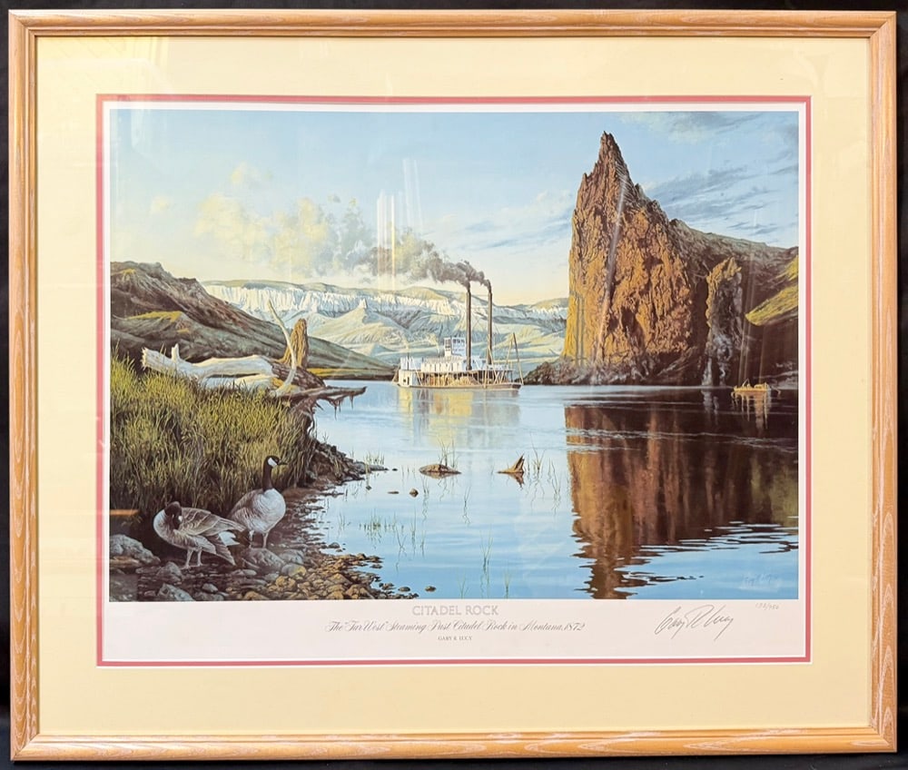GARY R. LUCY "CITADEL ROCK ? THE FAR WEST STEAMING PAST CITADEL ROCK IN MONTANA, 1872" LIMITED: An exceptional limited-edition print by American artist Gary R. Lucy, titled "Citadel Rock – The Far West Steaming Past Citadel Rock in Montana, 1872," depicting a majestic paddlewheel steamboat
