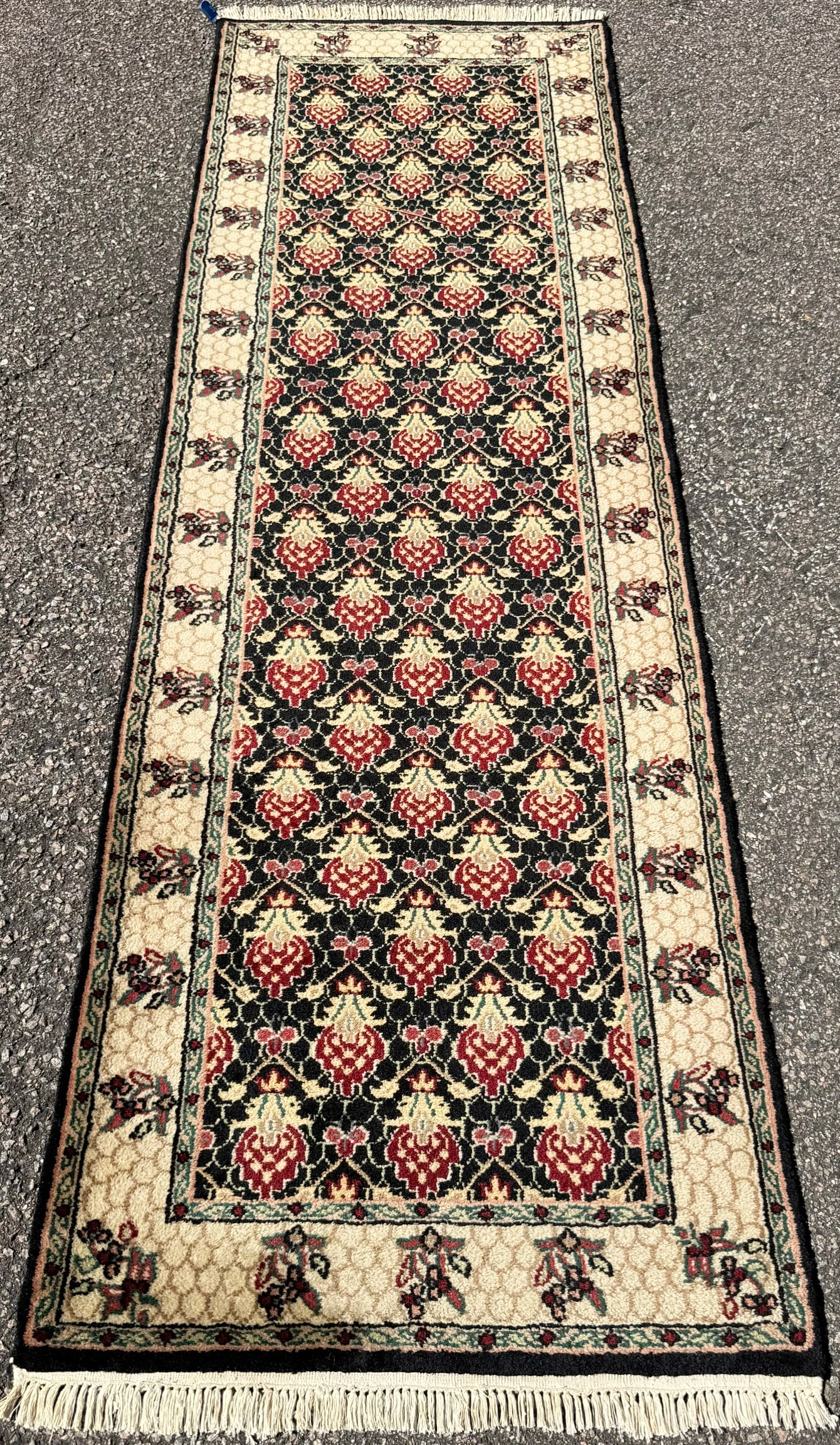 SARABAND MIR HAND KNOTTED RUNNER, 2.6 x 8.1 (76cm x 246cm): Offered here is a Saraband Mir runner was hand knotted in India of 100 percent natural wool on a cotton foundation. This rug has full, wool piles and is in like new condition. The drama