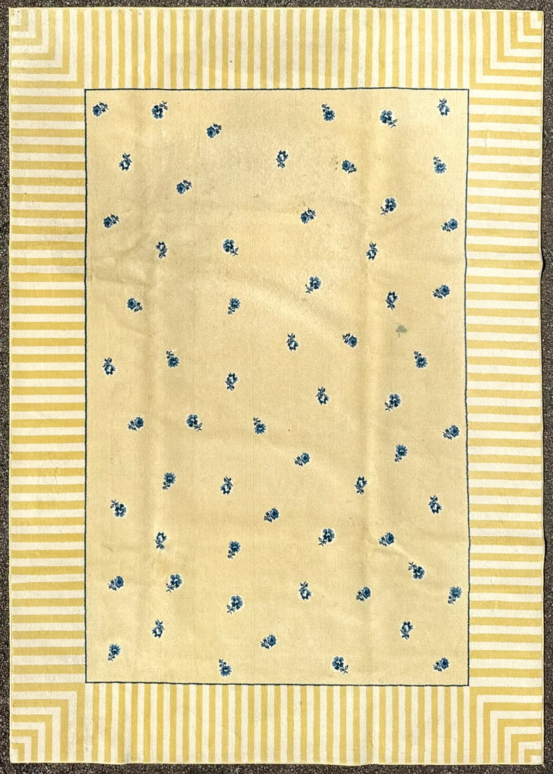 SHAW BONNIE, CANARY DESIGNER AREA RUG, 7.8 x 10.9 (231cm x 330cm): A spirited, machine-made area rug by Shaw Rugs which was produced in the USA, presenting a fresh, highly decorative palette of buttery canary yellow, warm ivory, and deep denim blue. The open central 