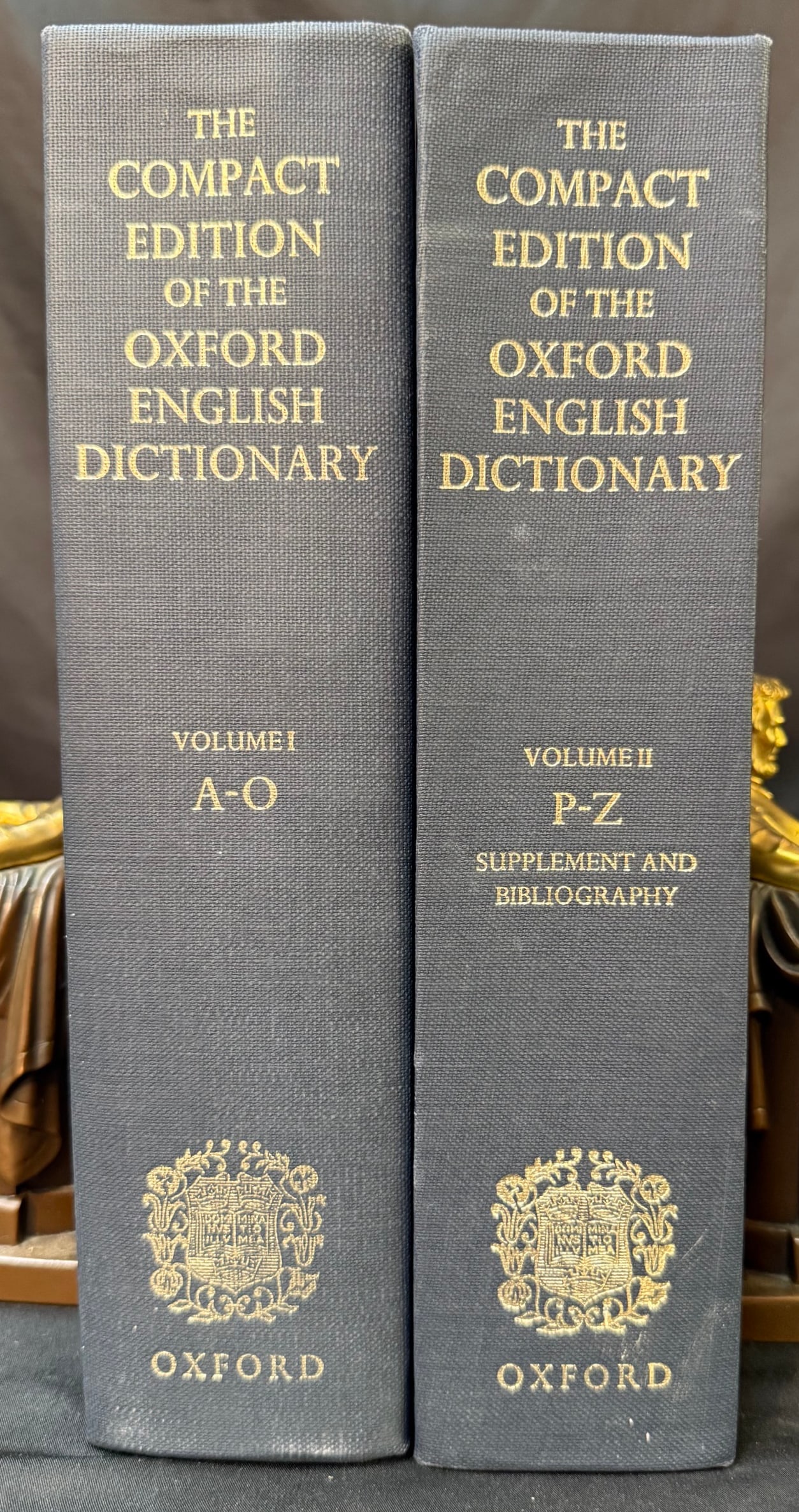 COMPLETE 2-VOLUME COMPACT OXFORD ENGLISH DICTIONARY, OXFORD UNIVERSITY PRESS, 1973: An imposing complete two-volume set of The Compact Edition of the Oxford English Dictionary, one of the most celebrated reference works ever devoted to the English language. Published by Oxford Univer