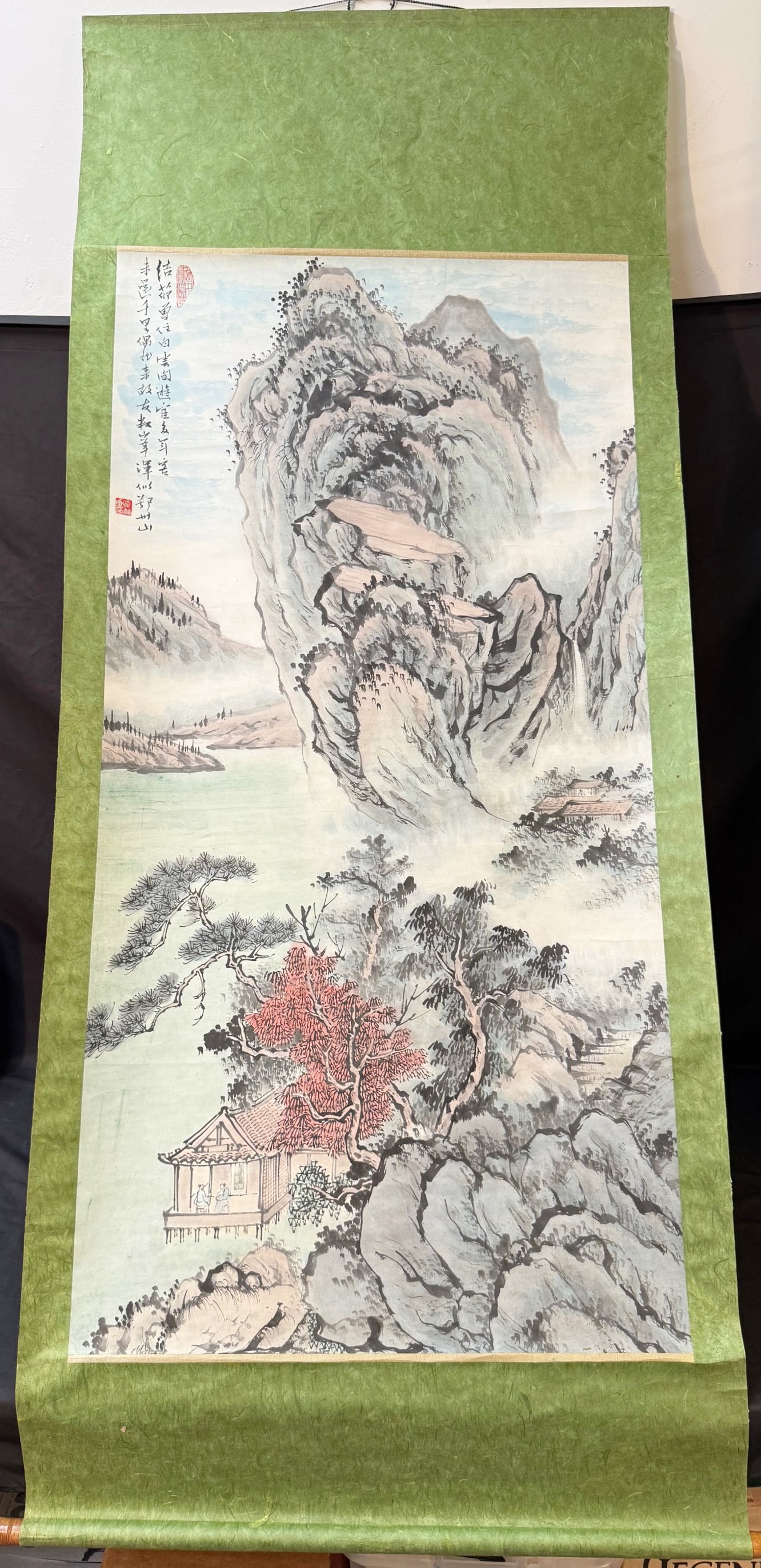 CHINESE LANDSCAPE HANGING SCROLL, INK AND COLOR, SIGNED BO SHAN, MID-20TH CENTURY, 32IN x 76IN (81cm: Beautiful hand-painted Chinese scroll depicting towering mountains, misty valleys, lakeside scenery, and a scholar’s pavilion tucked beneath colorful autumn foliage. Painted in the traditional l