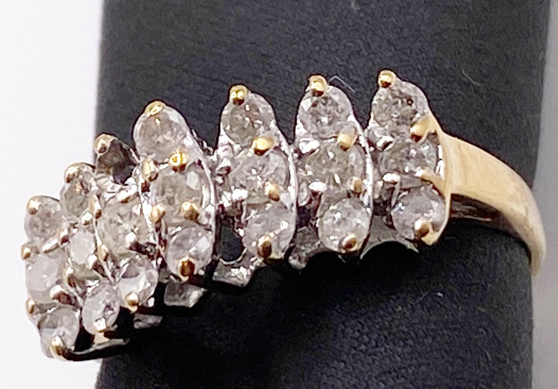 10K YELLOW GOLD, MULTI ROW DIAMOND RING, AND RECENT APPRAISAL: 10K yellow gold and multi-row diamond ring. The ring contains three rows of round brilliant cut diamonds. Each row contains 7 stones that are all I2 in clarity and H-I in color with a combined total w