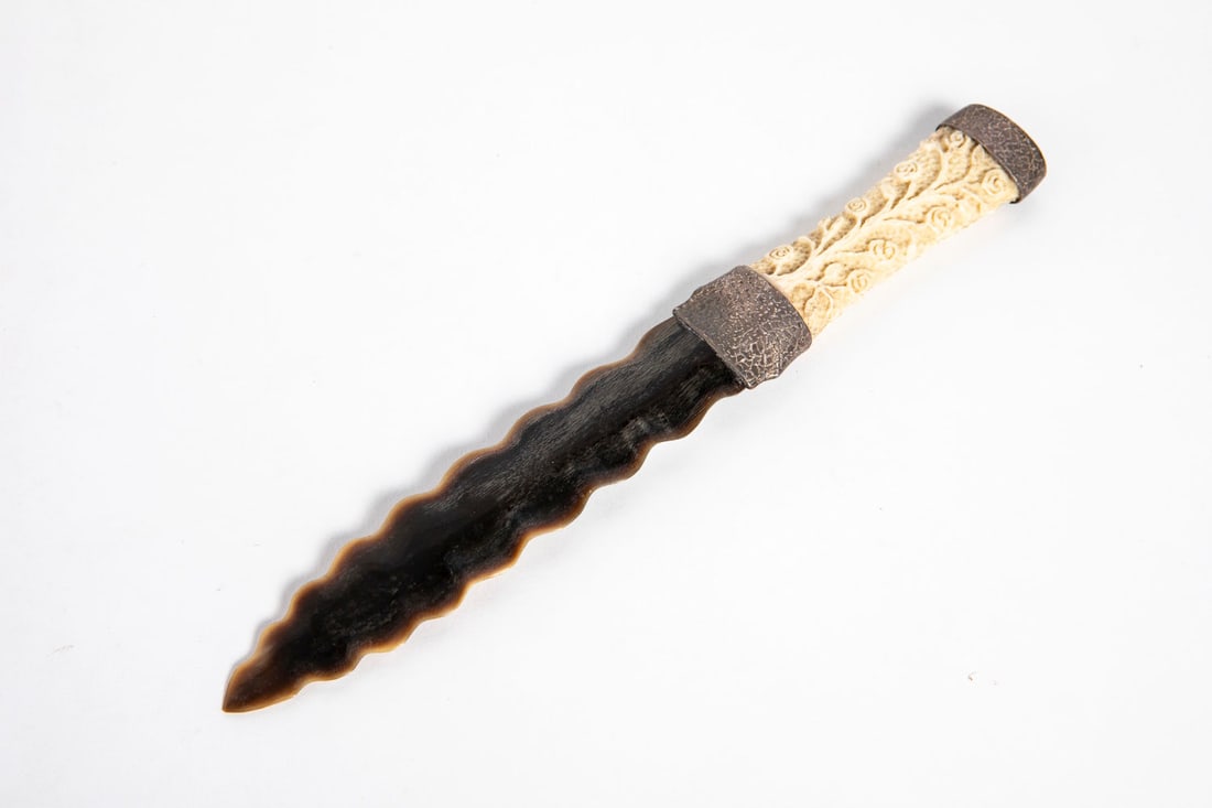 A Dagger made of Horn with Organic Material Handle and Silver Accents: Length: 23 cm