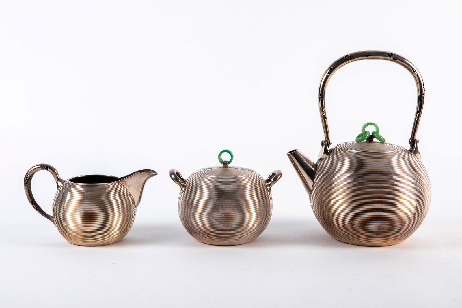 A very high quality Japanese silver tea set, late 19th or early 20th century, made of 950 silver, (1 of 7)