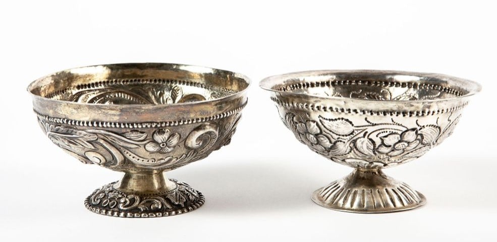 A pair of antique 19th-century German silver bowls, in the 17th-century style, signed with Pseudo: A pair of antique 19th-century German silver bowls, in the 17th-century style, signed with Pseudo Hallmark, decorated with repouss?© work, one of them bears inscription in Hebrew '×™×¨×•×